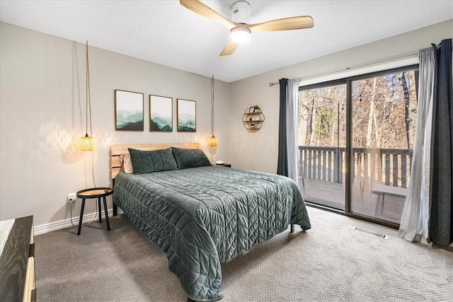 bedroom with ceiling fan, carpet floors, and access to outside