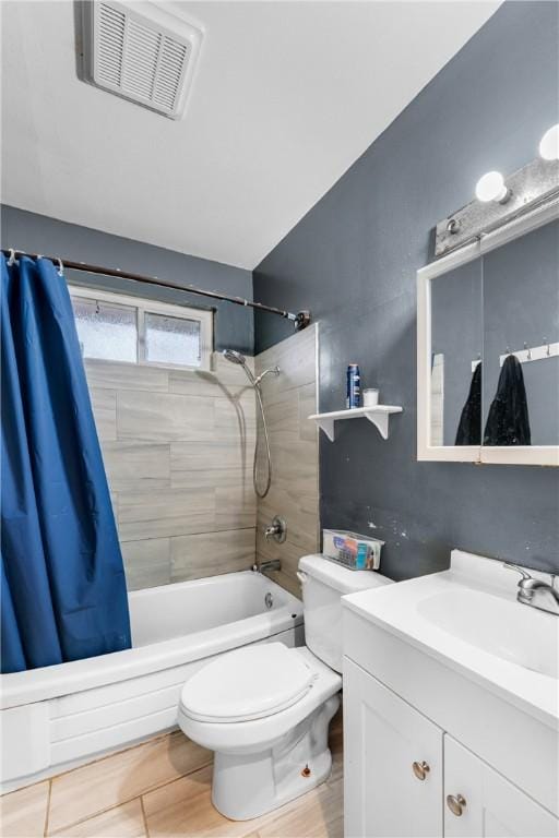 full bathroom with shower / bathtub combination with curtain, vanity, and toilet