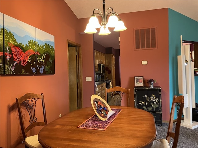 dining space featuring an inviting chandelier