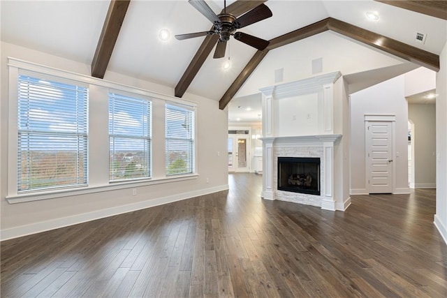 unfurnished living room with ceiling fan, beam ceiling, dark hardwood / wood-style flooring, and high vaulted ceiling