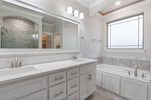 bathroom with backsplash, vanity, plus walk in shower, and ornamental molding