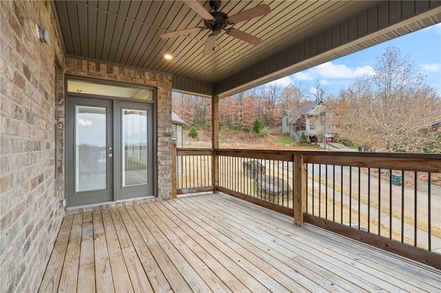 wooden deck with ceiling fan