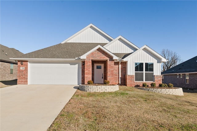 view of front facade featuring a front yard and a garage