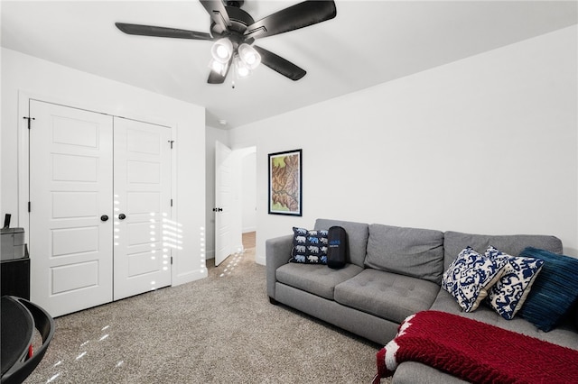 living room with carpet and ceiling fan