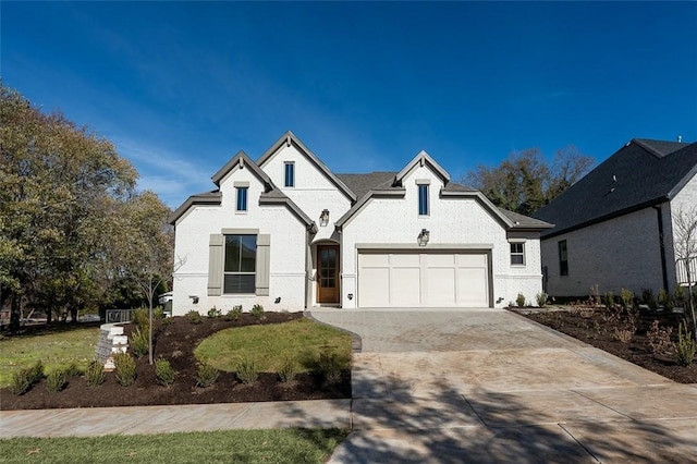 french country inspired facade with a garage