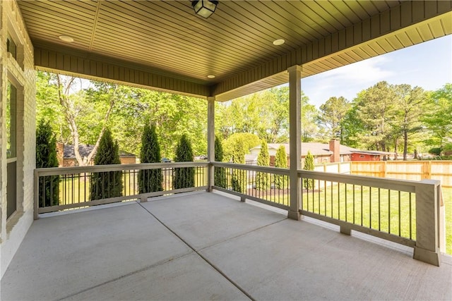 view of patio featuring fence