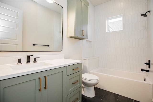 full bathroom with tile patterned flooring, vanity, toilet, and tiled shower / bath