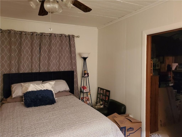 bedroom with ceiling fan and crown molding