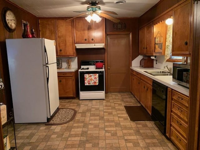 kitchen with ceiling fan, sink, white appliances, and hanging light fixtures