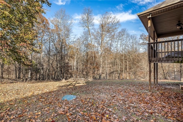 view of yard featuring ceiling fan