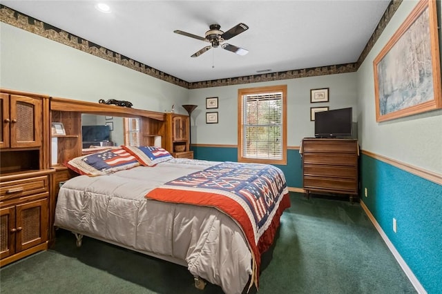 15262 Shipe Rd, Gravette, AR 72736 - bedroom with dark carpet and a ceiling fan