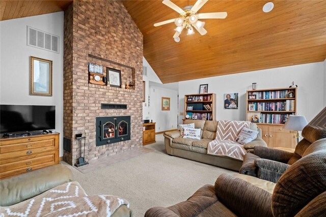 15262 Shipe Rd, Gravette, AR 72736 - carpeted living area featuring wood ceiling, a fireplace, high vaulted ceiling, and ceiling fan