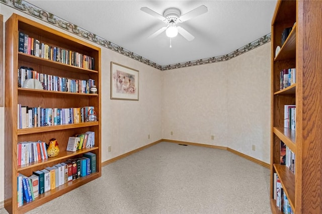15262 Shipe Rd, Gravette, AR 72736 - empty room with carpet flooring, baseboards, and a ceiling fan