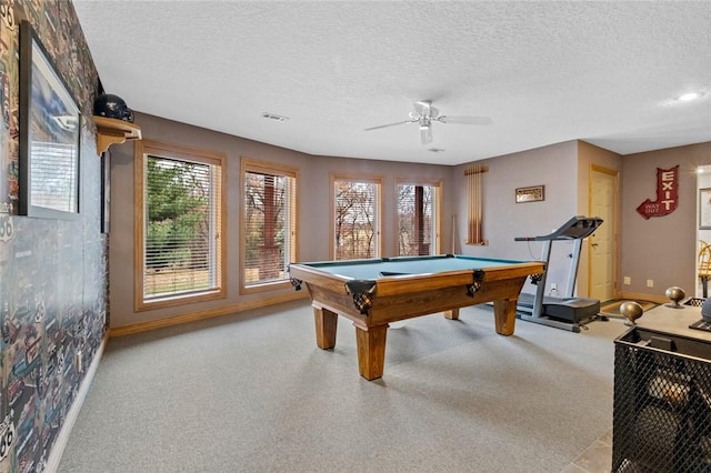 rec room featuring a healthy amount of sunlight, a textured ceiling, and pool table