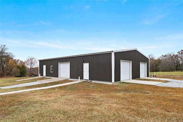 garage with a yard