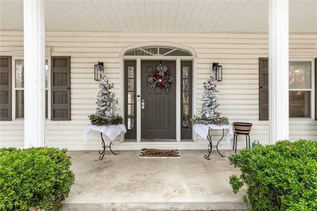 entrance to property with a porch