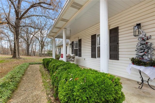 view of home's exterior with a porch