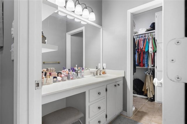 bathroom with vanity and tile patterned floors