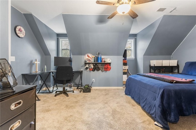 carpeted bedroom with ceiling fan and lofted ceiling