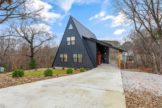 modern inspired farmhouse featuring a carport