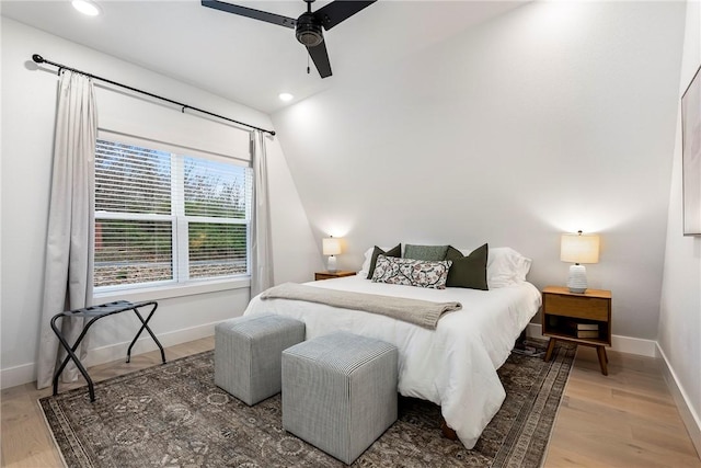 bedroom featuring recessed lighting, baseboards, and wood finished floors