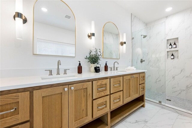 bathroom featuring vanity and a tile shower