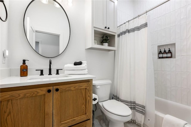 full bathroom featuring toilet, vanity, and shower / tub combo with curtain