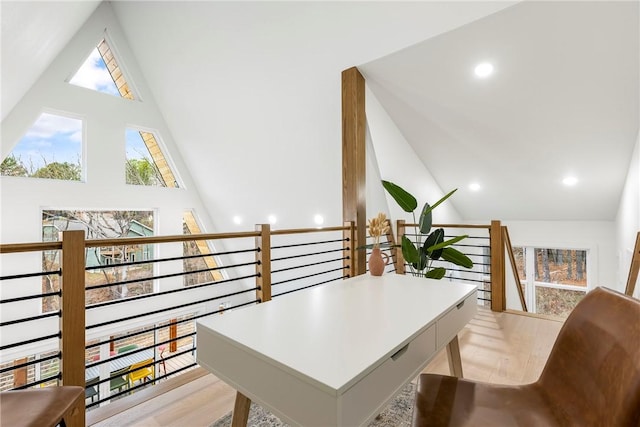 office area featuring recessed lighting, light wood-style flooring, and high vaulted ceiling