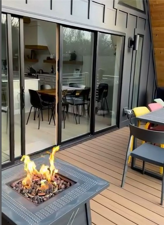 exterior space featuring an outdoor fire pit