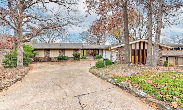 ranch-style house featuring a garage