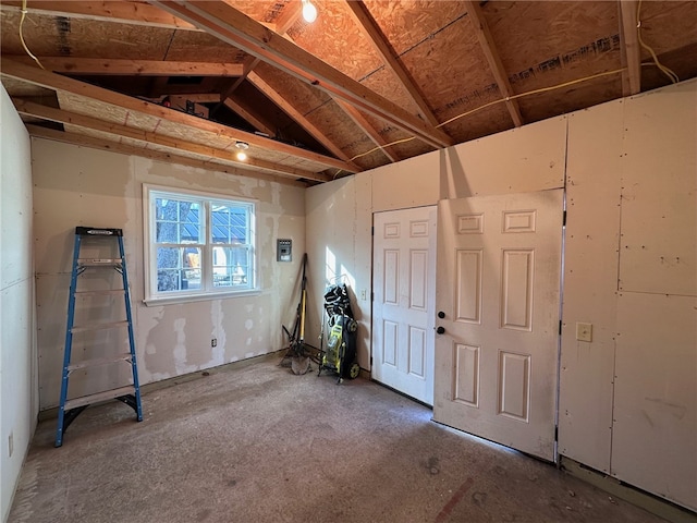 misc room with lofted ceiling