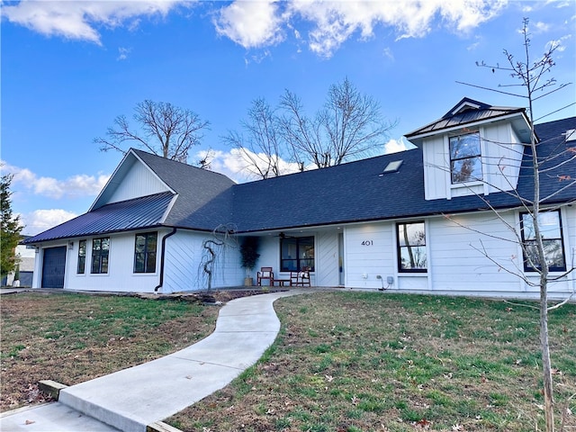 view of front of house with a front lawn