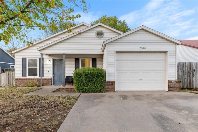 ranch-style home featuring a garage