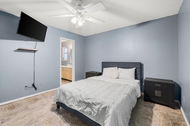 bedroom featuring a textured ceiling, ceiling fan, and ensuite bathroom