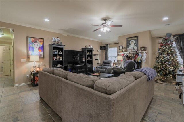 living room with ceiling fan and ornamental molding