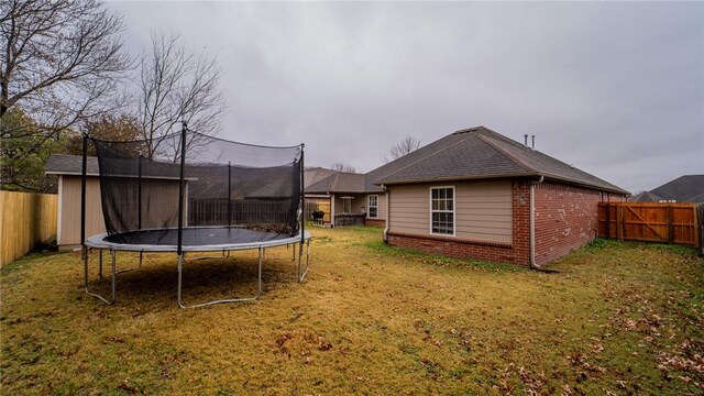 view of yard featuring a trampoline