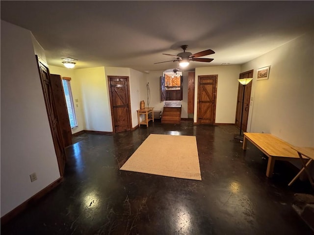 interior space featuring ceiling fan