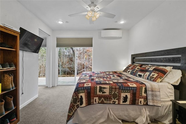 bedroom featuring carpet, ceiling fan, access to exterior, and a wall unit AC