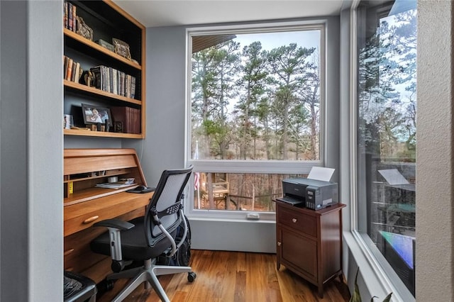 office area with hardwood / wood-style floors