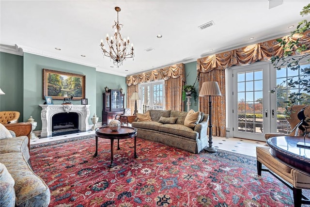 living room with french doors, an inviting chandelier, and crown molding