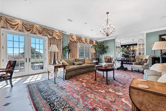 living room featuring a notable chandelier, ornamental molding, and french doors