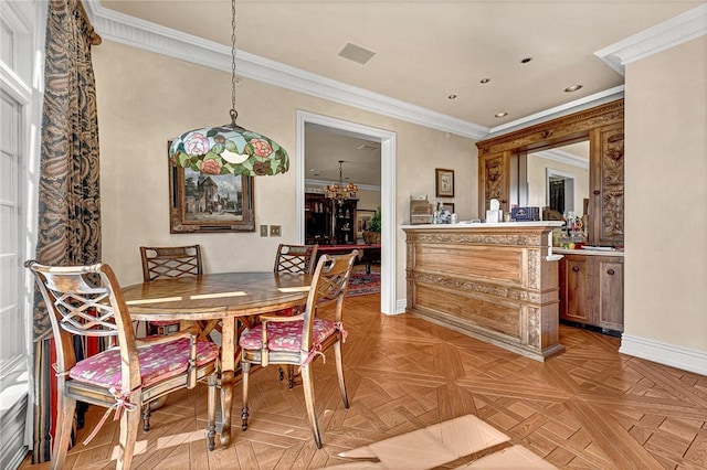 dining room with crown molding, an inviting chandelier, and parquet flooring