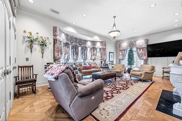 living room featuring crown molding and light parquet flooring