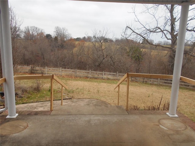 view of yard with a patio area and a rural view