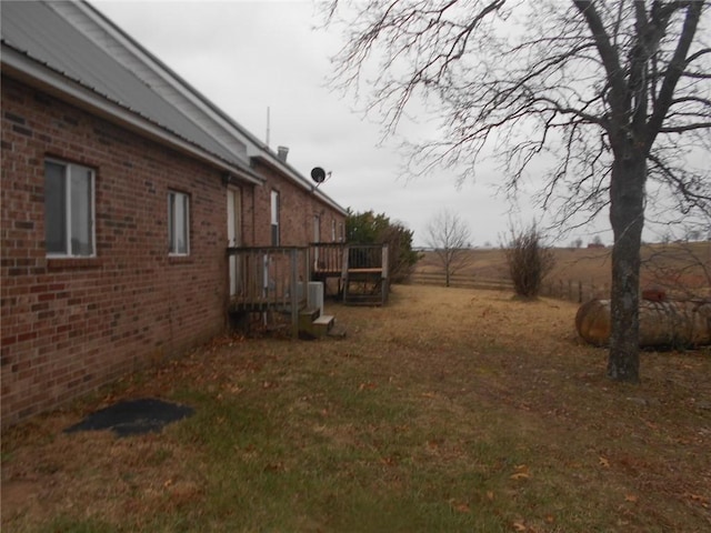 view of yard featuring a deck