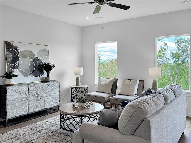 5341 Selah St, Springdale, AR 72764 - living area featuring wood finished floors, ceiling fan, plenty of natural light, and recessed lighting