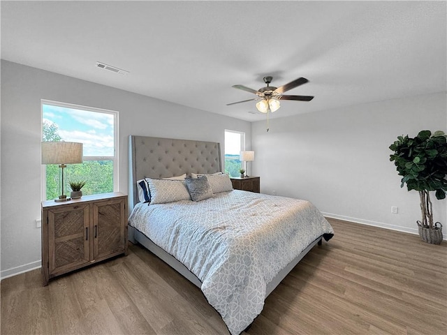 5341 Selah St, Springdale, AR 72764 - bedroom with wood finished floors and ceiling fan