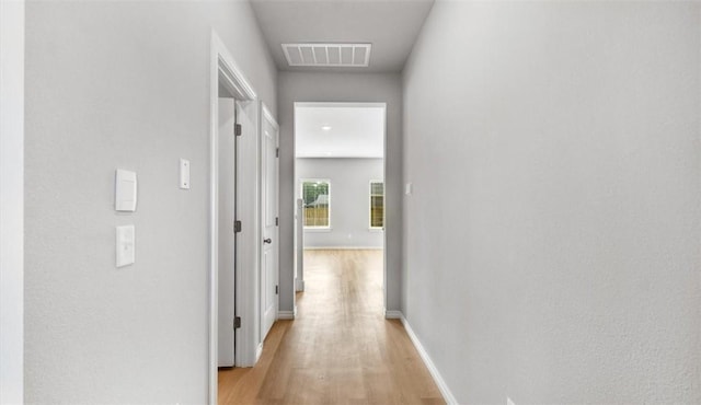 hallway featuring light wood-type flooring