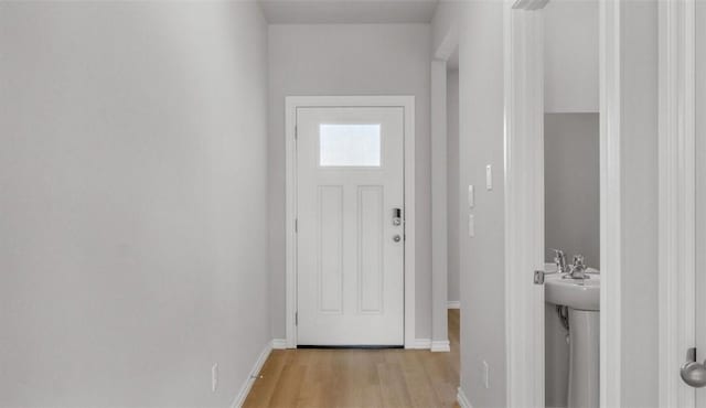 doorway featuring light wood-type flooring