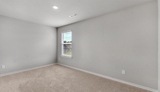 empty room featuring carpet floors